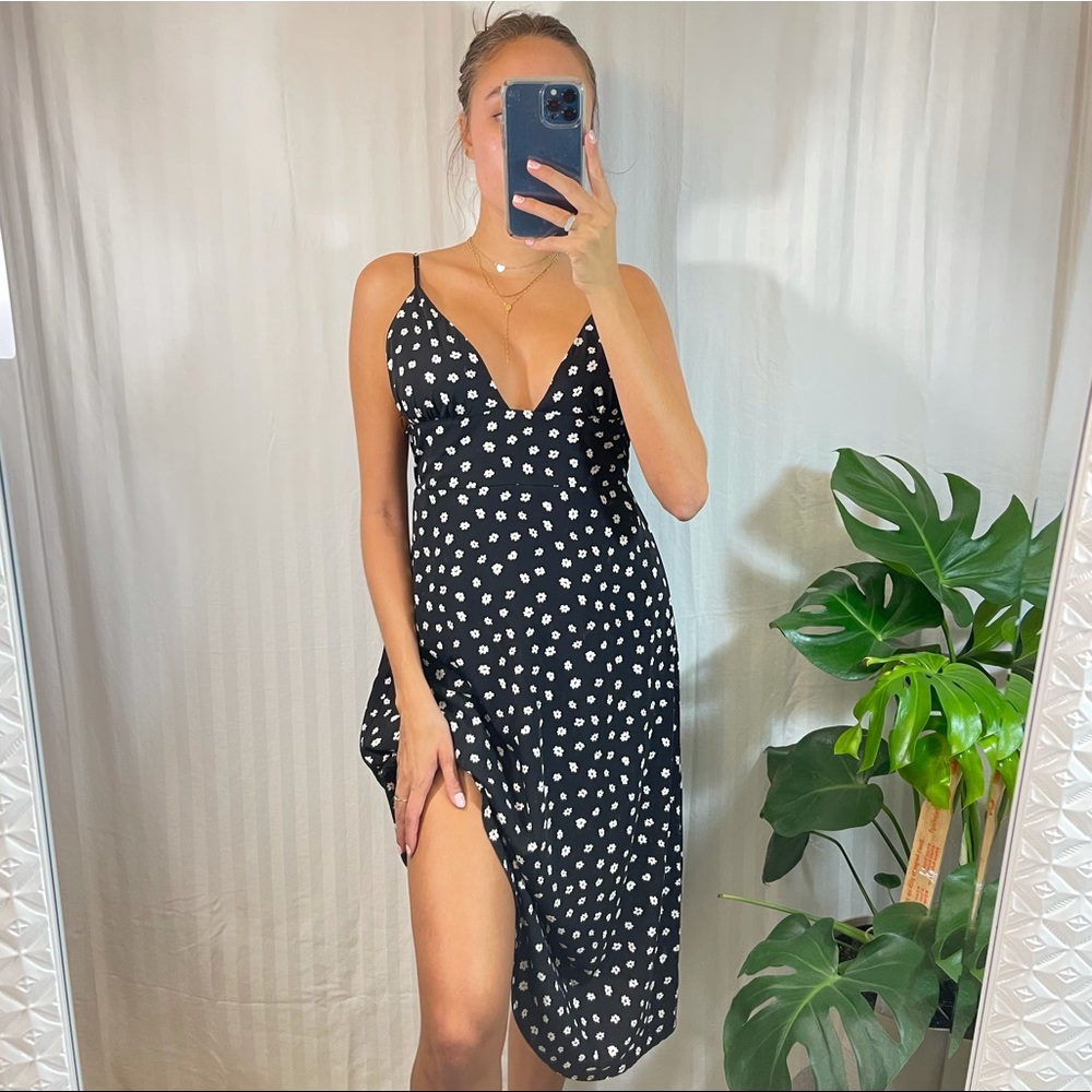 Dress Forum Black and White Floral Midi Dress with V-cut Neckline